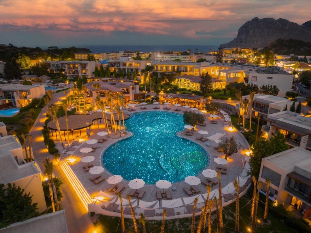 Overhead view of the lagoon-style pool at Port Royal Villas & Spa adults-only resort in Rhodes, Greece